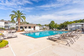 sparkling pool and sundeck at 701 South Apartments in Mobile, AL